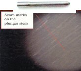 Score marks on plunger stem
